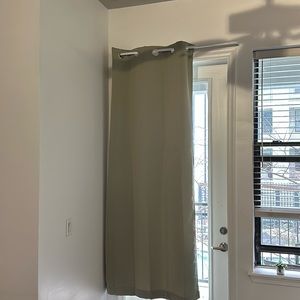 Two sage green matching curtains